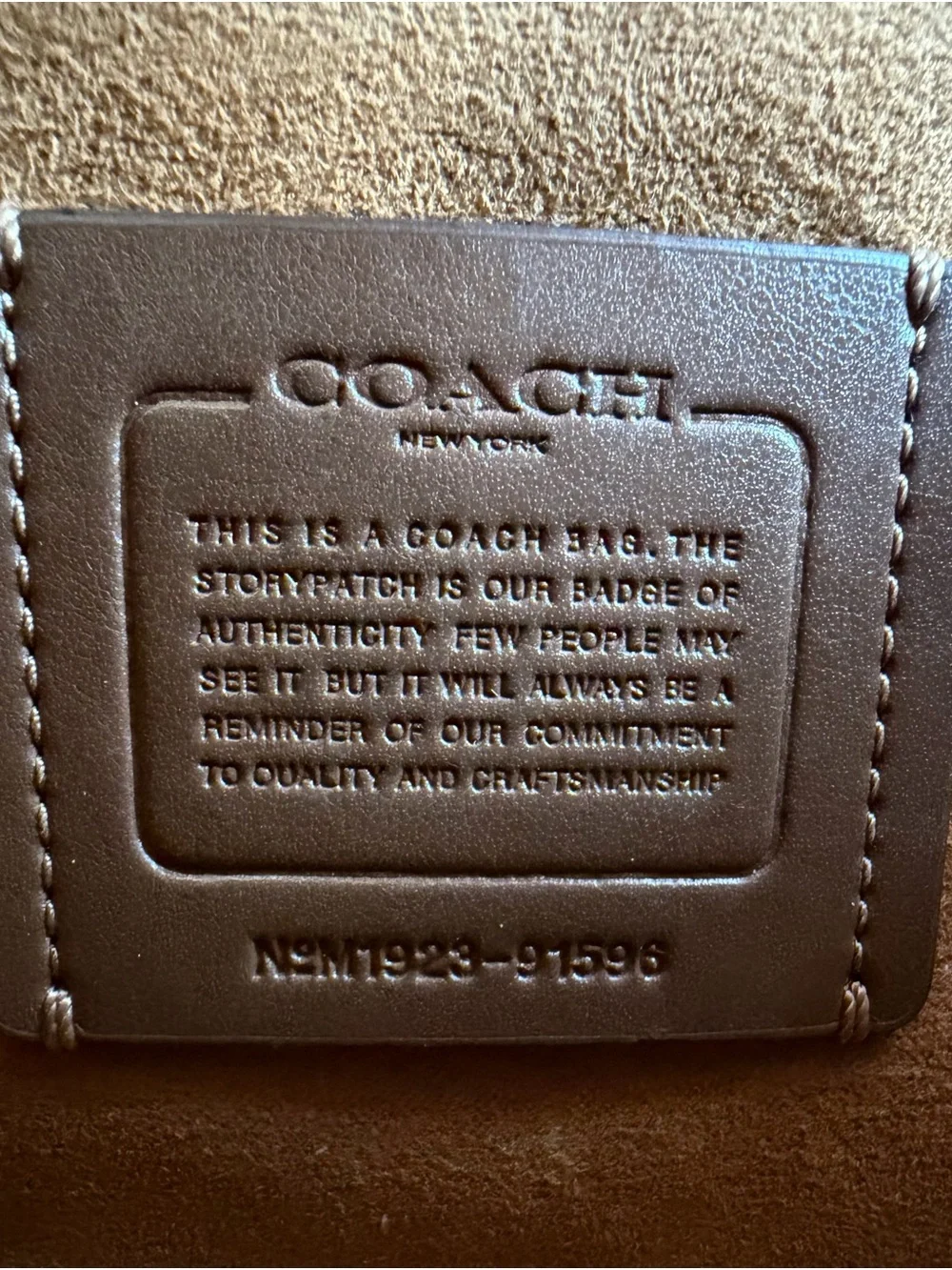 Coach Zoe Carryall bag with chain charm